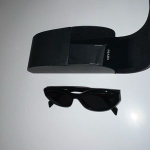 Women’s black Prada sunglasses